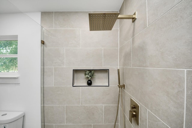 6249 Locke Ln, Houston, TX 77057 - bathroom with a tile shower and toilet