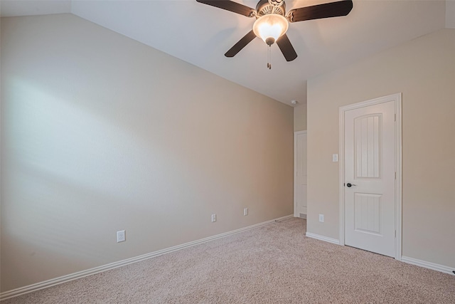 20619 Cactus Lake Ln, Richmond, TX 77407 - unfurnished bedroom with lofted ceiling, carpet flooring, baseboards, and a ceiling fan