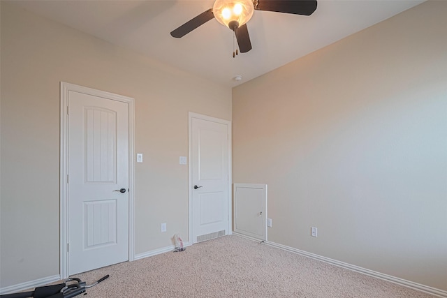 20619 Cactus Lake Ln, Richmond, TX 77407 - unfurnished bedroom featuring carpet, baseboards, and ceiling fan