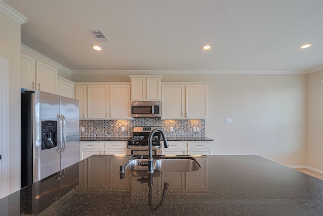 20619 Cactus Lake Ln, Richmond, TX 77407 - kitchen with stainless steel appliances, a sink, tasteful backsplash, crown molding, and white cabinets