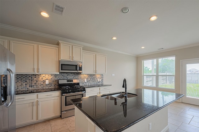 20619 Cactus Lake Ln, Richmond, TX 77407 - kitchen featuring appliances with stainless steel finishes, a sink, tasteful backsplash, dark stone counters, and ornamental molding