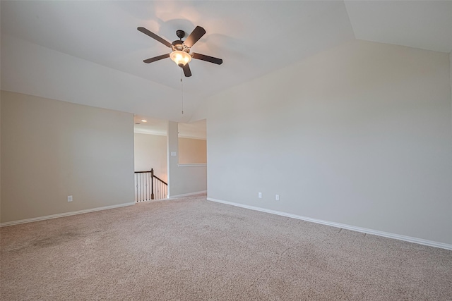 20619 Cactus Lake Ln, Richmond, TX 77407 - spare room with lofted ceiling, carpet, ceiling fan, and baseboards