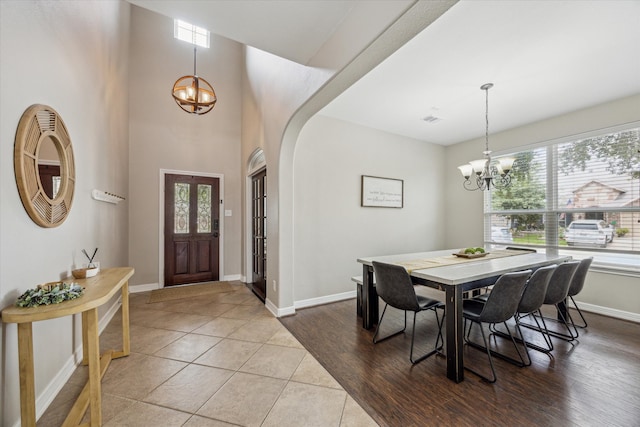 9982 Manor Spring Ln, Brookshire, TX 77423 - foyer entrance featuring a chandelier, baseboards, and tile patterned floors