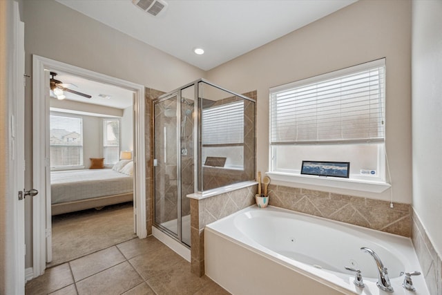 9982 Manor Spring Ln, Brookshire, TX 77423 - bathroom with a tub with jets, tile patterned flooring, a stall shower, ensuite bath, and ceiling fan