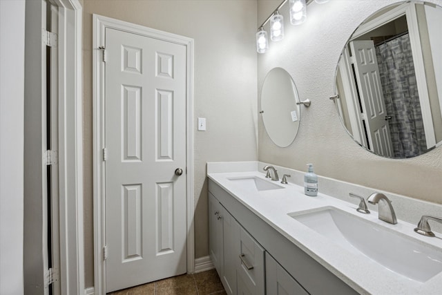 9982 Manor Spring Ln, Brookshire, TX 77423 - bathroom with double vanity and tile patterned flooring