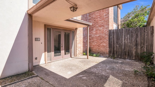 2814 Cambridge Ln, Missouri City, TX 77459 - view of patio featuring french doors