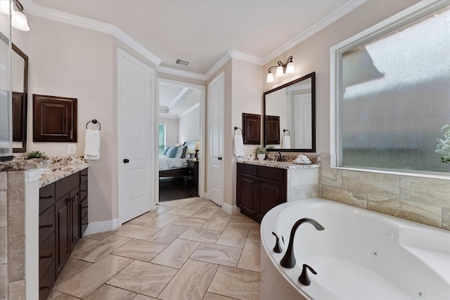 515 Arbor Point Ct, Pinehurst, TX 77362 - bathroom with ensuite bathroom, two vanities, a tub with jets, crown molding, and baseboards