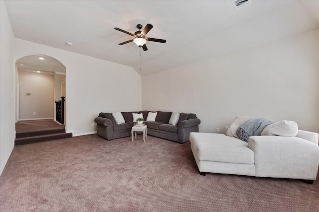 515 Arbor Point Ct, Pinehurst, TX 77362 - carpeted living room with arched walkways, a ceiling fan, baseboards, recessed lighting, and lofted ceiling