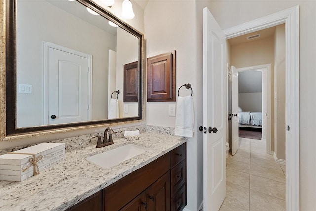 515 Arbor Point Ct, Pinehurst, TX 77362 - bathroom featuring vanity and tile patterned flooring