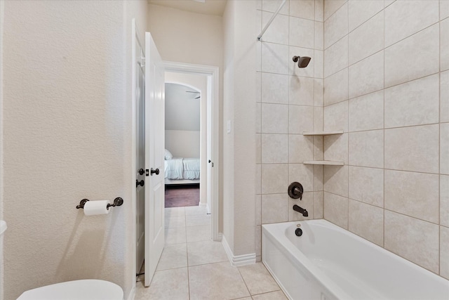 515 Arbor Point Ct, Pinehurst, TX 77362 - ensuite bathroom with tile patterned flooring, bathtub / shower combination, toilet, and a textured wall