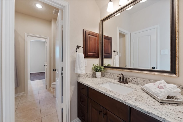 515 Arbor Point Ct, Pinehurst, TX 77362 - bathroom with vanity, tile patterned floors, and toilet
