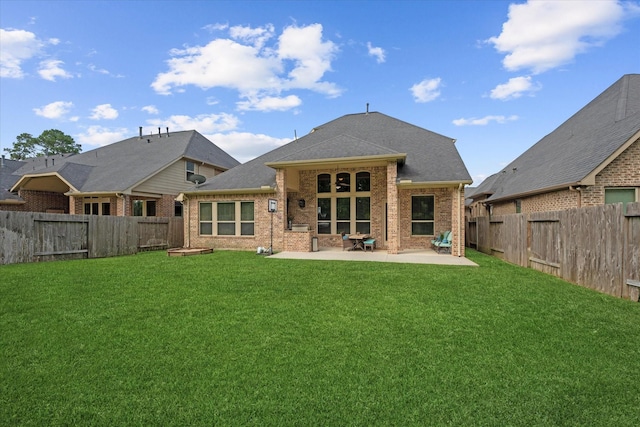 515 Arbor Point Ct, Pinehurst, TX 77362 - rear view of property with a patio, brick siding, and roof with shingles