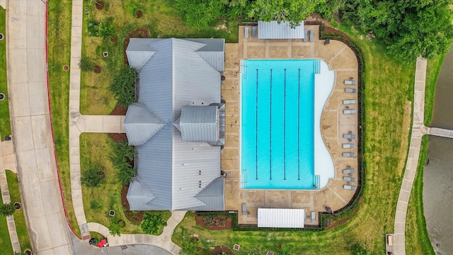 515 Arbor Point Ct, Pinehurst, TX 77362 - drone / aerial view of a pool