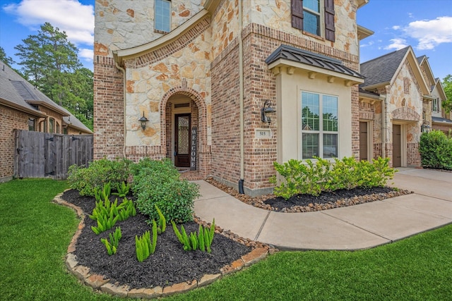 515 Arbor Point Ct, Pinehurst, TX 77362 - entrance to property with stone siding, brick siding, and stucco siding