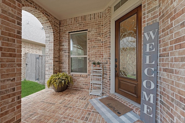 515 Arbor Point Ct, Pinehurst, TX 77362 - property entrance with brick siding