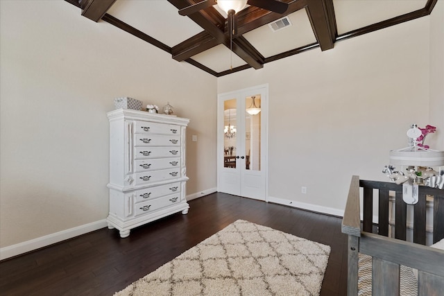 515 Arbor Point Ct, Pinehurst, TX 77362 - bedroom with coffered ceiling, dark wood-type flooring, baseboards, and beamed ceiling