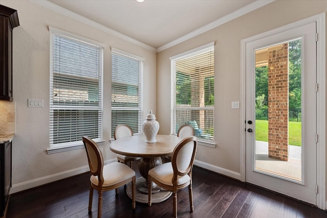 515 Arbor Point Ct, Pinehurst, TX 77362 - dining area with crown molding, baseboards, healthy amount of natural light, dark wood-style floors, and a textured wall
