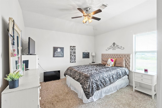 6407 Hillock Ln, Pearland, TX 77584 - carpeted bedroom with baseboards, vaulted ceiling, and a ceiling fan