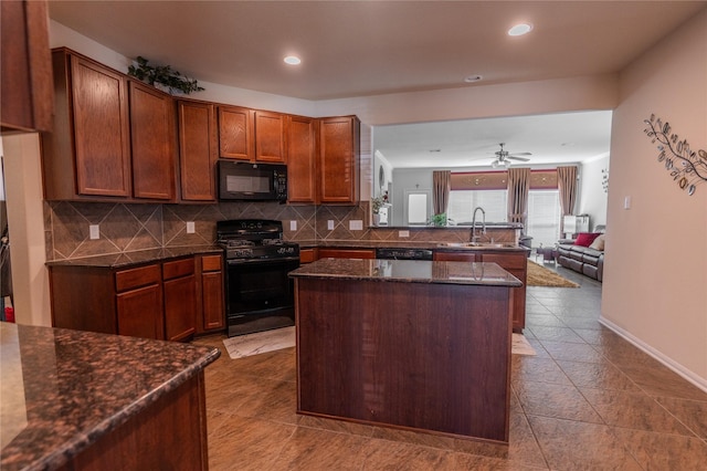 3418 Quarry Place Ln, Katy, TX 77493 - kitchen featuring black appliances, a sink, decorative backsplash, a ceiling fan, and recessed lighting