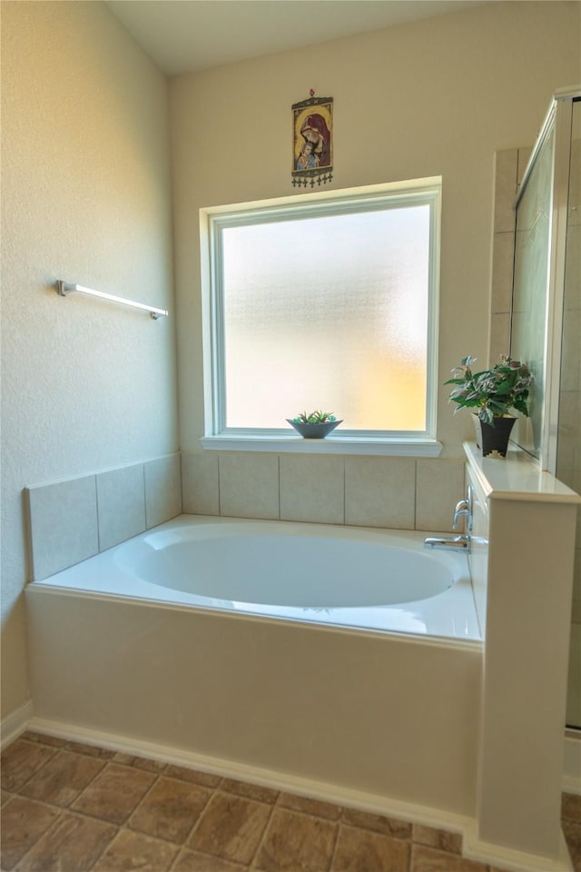 3418 Quarry Place Ln, Katy, TX 77493 - full bath with healthy amount of natural light, a garden tub, and a shower with shower door