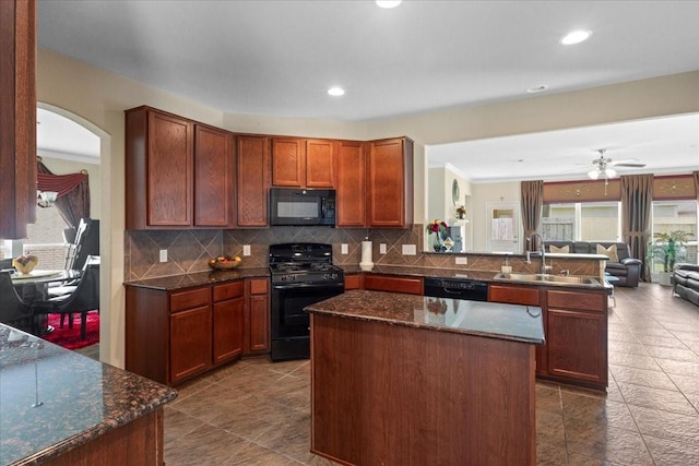 3418 Quarry Place Ln, Katy, TX 77493 - kitchen featuring black appliances, healthy amount of natural light, a peninsula, open floor plan, and recessed lighting