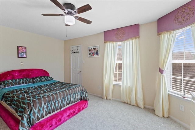 3418 Quarry Place Ln, Katy, TX 77493 - bedroom featuring carpet floors, multiple windows, and a ceiling fan