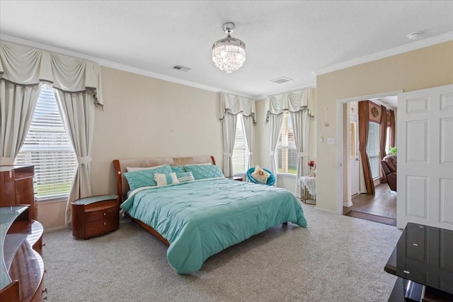 3418 Quarry Place Ln, Katy, TX 77493 - carpeted bedroom with ornamental molding, multiple windows, and a chandelier