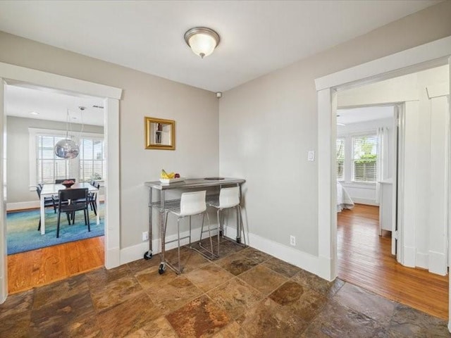 1427 Hall Pl, Houston, TX 77008 - dining space featuring baseboards and wood finished floors