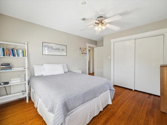 1427 Hall Pl, Houston, TX 77008 - bedroom featuring a closet, wood finished floors, and a ceiling fan