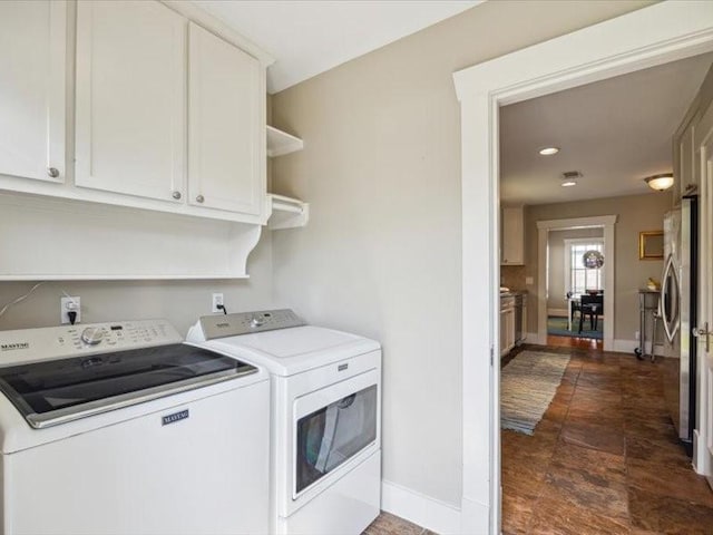 1427 Hall Pl, Houston, TX 77008 - laundry area featuring separate washer and dryer, cabinet space, baseboards, and recessed lighting