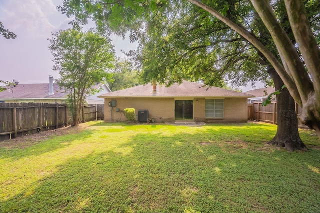 11714 Welshpool Glen Dr, Houston, TX 77066 - rear view of property with central AC unit