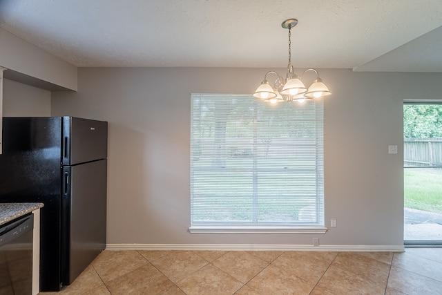11714 Welshpool Glen Dr, Houston, TX 77066 - unfurnished dining area featuring light tile patterned floors, baseboards, and a chandelier