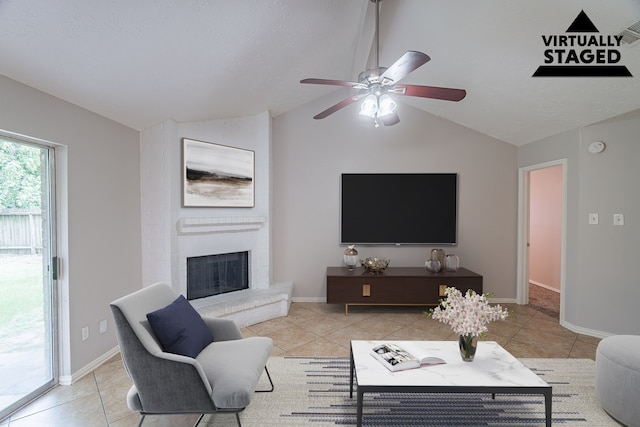 11714 Welshpool Glen Dr, Houston, TX 77066 - tiled living area with vaulted ceiling, ceiling fan, a fireplace, and baseboards