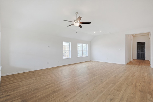 27519 Beachside Arbor Dr, Katy, TX 77493 - spare room with a ceiling fan, vaulted ceiling, light wood finished floors, baseboards, and recessed lighting