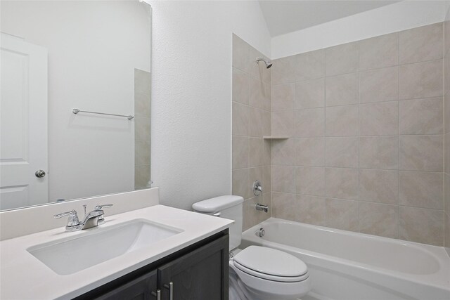 27519 Beachside Arbor Dr, Katy, TX 77493 - bathroom with toilet, vanity, and bathtub / shower combination