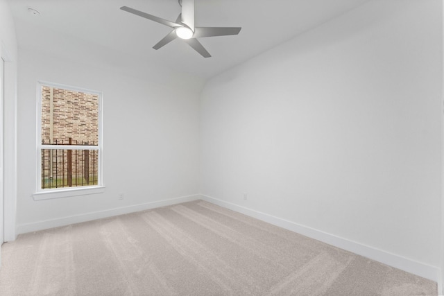 26915 Longwood Ledge Dr, Spring, TX 77389 - spare room with light carpet, baseboards, and ceiling fan