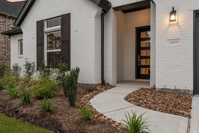 26915 Longwood Ledge Dr, Spring, TX 77389 - doorway to property featuring brick siding