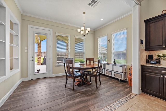 15702 Belmar Heights Dr, Cypress, TX 77429 - dining space featuring ornamental molding, a chandelier, wood finished floors, baseboards, and recessed lighting
