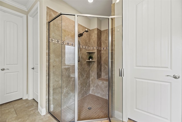 15702 Belmar Heights Dr, Cypress, TX 77429 - full bathroom featuring a stall shower, ornamental molding, baseboards, and tile patterned flooring