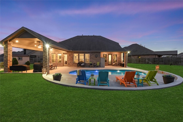 15702 Belmar Heights Dr, Cypress, TX 77429 - back of property featuring brick siding and a patio area