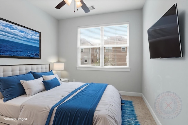 904 W 20th St Unit C, Houston, TX 77008 - carpeted bedroom with baseboards and a ceiling fan