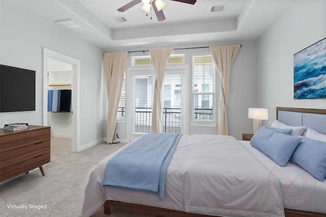 904 W 20th St Unit C, Houston, TX 77008 - carpeted bedroom featuring access to outside, ceiling fan, a raised ceiling, and baseboards