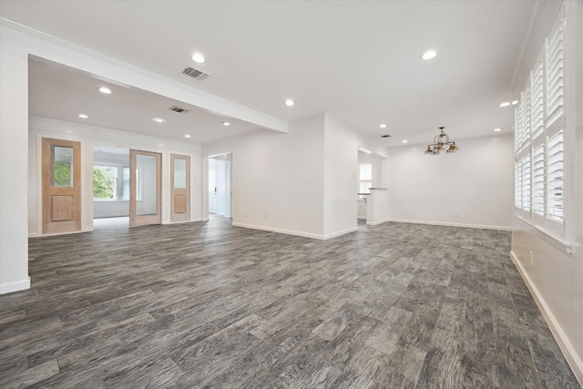 3831 Linklea Dr, Houston, TX 77025 - unfurnished living room featuring dark wood-style flooring, a chandelier, baseboards, recessed lighting, and crown molding