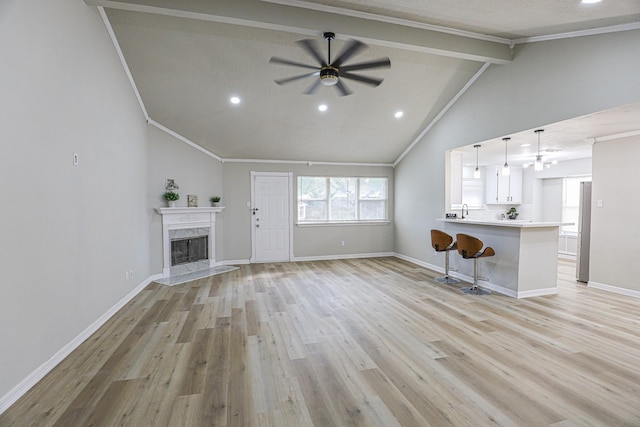 14139 Whispering Palms Dr, Houston, TX 77066 - unfurnished living room featuring ceiling fan, light wood-style flooring, a high end fireplace, recessed lighting, and baseboards