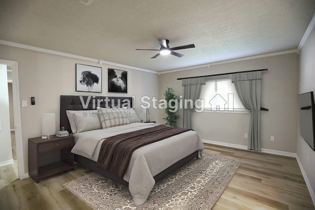 14139 Whispering Palms Dr, Houston, TX 77066 - bedroom with light wood finished floors, ornamental molding, baseboards, a ceiling fan, and a textured ceiling