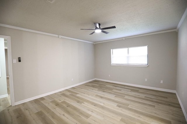 14139 Whispering Palms Dr, Houston, TX 77066 - empty room featuring a ceiling fan, ornamental molding, baseboards, light wood-type flooring, and a textured ceiling