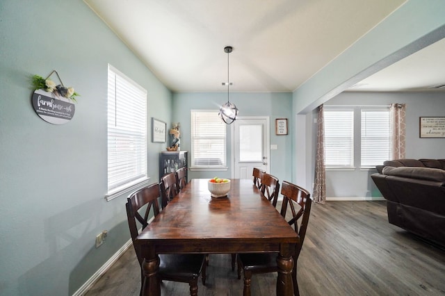 28935 Hidden Cove Dr, Magnolia, TX 77354 - dining room with wood finished floors, baseboards, and plenty of natural light