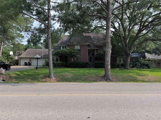6225 Morton Rd, Katy, TX 77493 - view of front facade with driveway, a garage, and a front yard