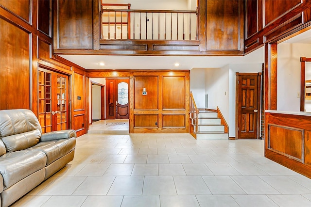 6225 Morton Rd, Katy, TX 77493 - foyer with stairs, a high ceiling, and light tile patterned flooring