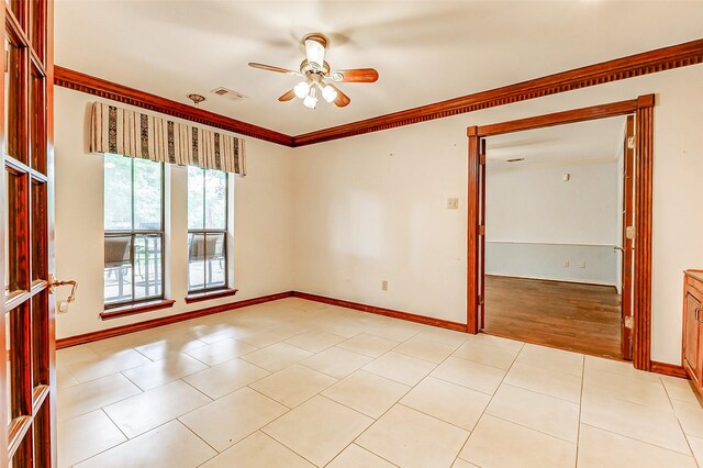6225 Morton Rd, Katy, TX 77493 - spare room featuring a ceiling fan, baseboards, and crown molding